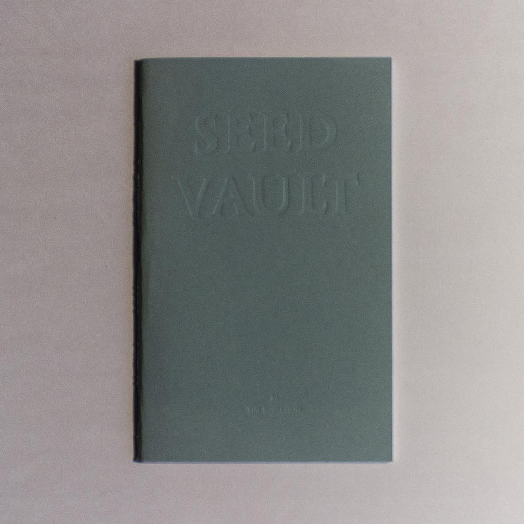 Seed Vault, front cover. "Seed Vault" is blind embossed into green-gray paper. Below is smaller text reading "by Tim Robertson."